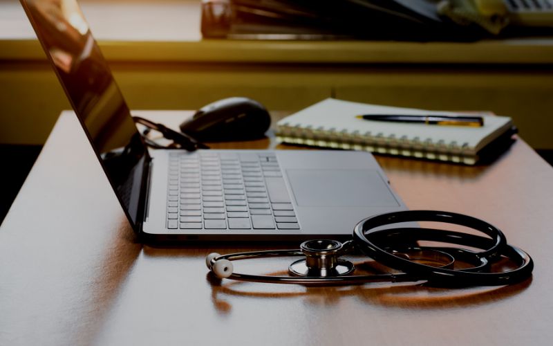 A computer and stethoscope